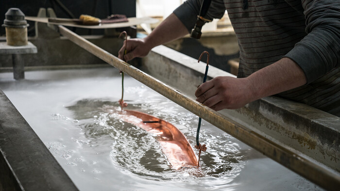 Galvanización con agua calentada por un compresor de tornillo.